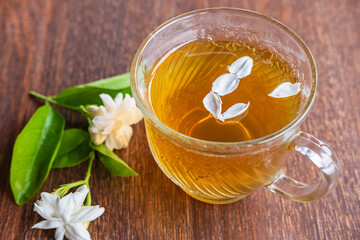 .A cup of tea and flowers on the table
