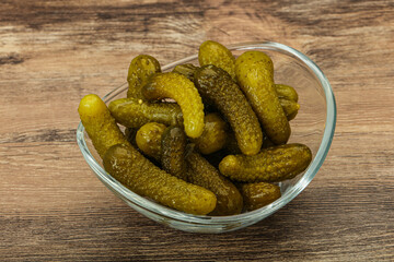 Pickled gherkin in the bowl