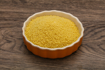 Raw cous cous heap in the bowl