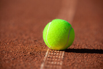 Tennis Ball on the White Line