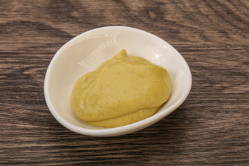 Dijon mustard sauce in the bowl