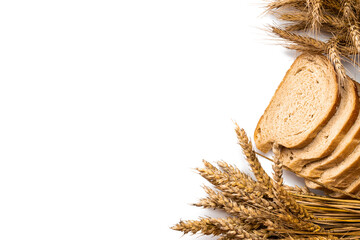Delicious bread. Fresh loaf of rustic traditional bread with wheat grain ear or spike plant isolated on white background. Rye bakery with crusty loaves and crumbs. Homemade baking.