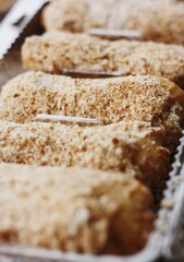 
Delicious eclairs with vanilla cream close up