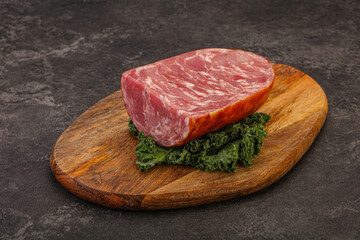Beef ham piece over board