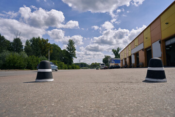 Road restraints on the road. Black and white traffic cone.