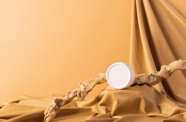 Cosmetics cream jar modern abstract podium trendy yellow background draped cloth