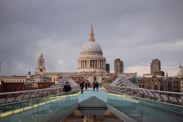 St Paul Cathedral from the Millennial Bridge under cloudy sky