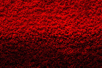 Rough red surface with a gradient. Abstract background with space to copy.