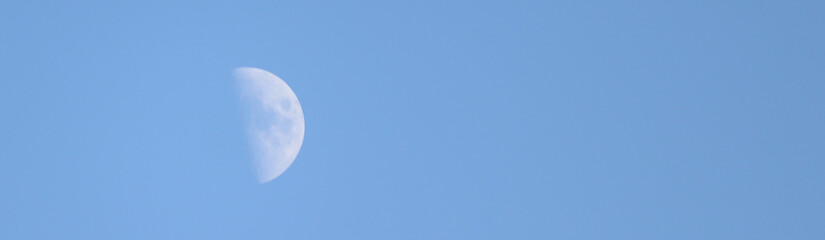 
appear in the sky in daytime moon, half moon