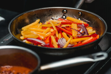 chef making healthy fresh fajitas or fajitos with beef. Easy, but tasty, healthy. National Mexican food, fresh oganic food.