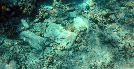 Fototapeta na wymiar A mysterious jumble of limestone building blocks at the bottom of the Red Sea. Sharm El Sheikh, Egypt