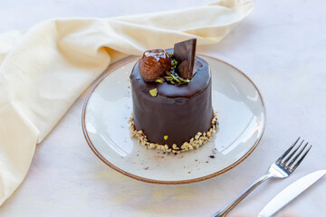 chocolate cake - on wooden background