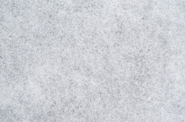 Surface covered with snow. Nature texture. Space for text. Snowy background. Abstract nature picture. Winter season, cold weather.