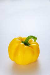 Yellow bell pepper isolated on white.