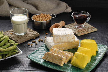 Soy Product: Raw Tofu, Tempeh, Soy Milk, Soy Sauce, and Soy Bean. Concept of Healthy Vegetarian Food