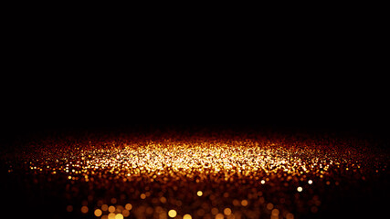 twinkling golden glitter lit by a bright spotlight, on a black background with depth of field effect