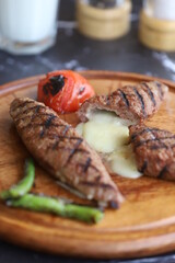 Meatballs with cheese on wooden floor - grill - kasarli kofte - kofta