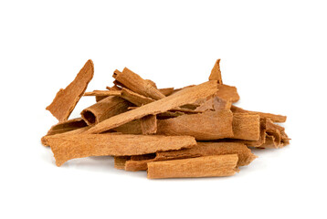 broken cinnamon sticks isolated on white background