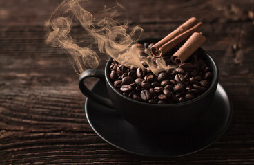 coffee beans in a Cup,aroma of coffee and cinnamon