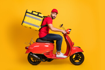 Profile photo of courier man ride motorbike wear bag red t-shirt hat jeans footwear isolated yellow...