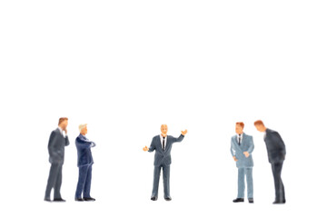 Miniature people, Businessman standing on white background