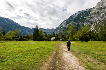 Fototapeta na wymiar Hiking trip in the region of Ukanc near the Lake Bohinj in the Triglav National Park in Slovenia on summer day with clouds