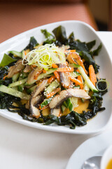 Smoked eel salad with seaweed