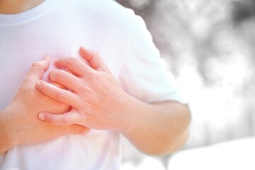 Image of a man holding a chest
