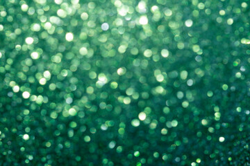 blurred festive emerald green glitter bokeh background