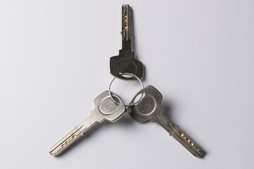 set of door keys on a white background. Safety concept,