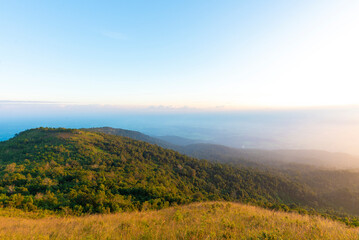 Fototapeta premium Beautiful scenery on the hilltop sunset at Khao Luang Sukhothai, Ramkhamhaeng National Park , Sukhothai Thailand.