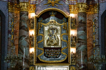 Fototapeta na wymiar Altar and Icon of the Virgin Mary in the Aglona Cathedral in Latvia.