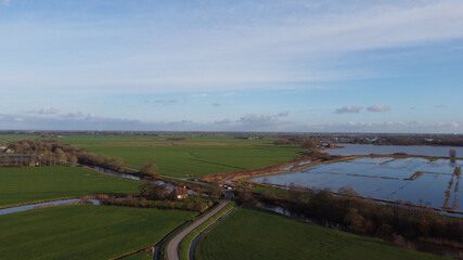 Naklejka premium Farmland around the lake Sneekermeer