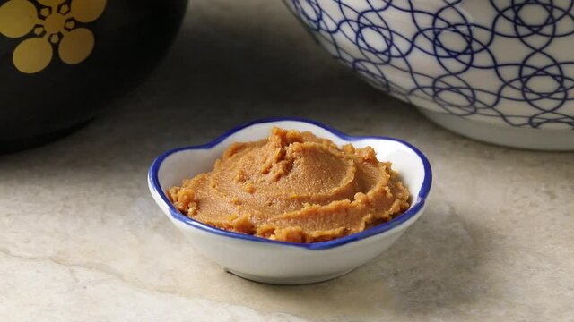 Bowl with Japanese shinshu shiro miso paste close up