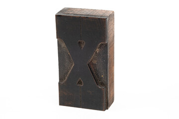 Antique letterpress type Letter X isolated on a white background