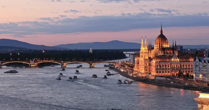 Dusk view to Parliament building and Danube river in Budapest, Hungary.