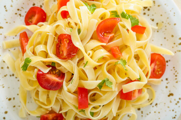 Plate with tasty pasta primavera, closeup