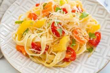 Plate with tasty pasta primavera, closeup
