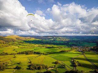 Paragliding in Peak district, an upland area in England at the southern end of the Pennines