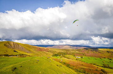 Paragliding in Peak district, an upland area in England at the southern end of the Pennines