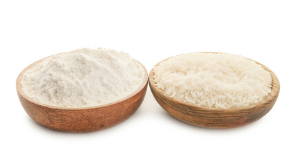 Plates with rice and flour on white background
