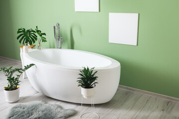 Naklejka na ściany i meble Interior of modern stylish bathroom with green wall