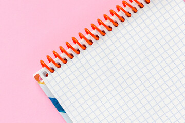 Open blank notepad on pink minimal backgrounds. Template with copy space for your text
