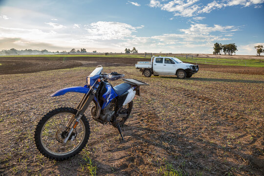 Motorbike and ute on farm