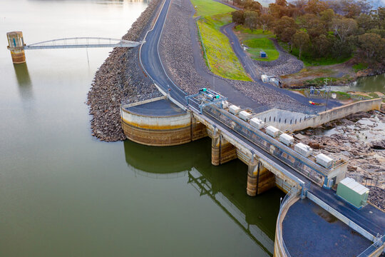 Aerial View Of A Water Tower And Flood Gates In A Dam Wall