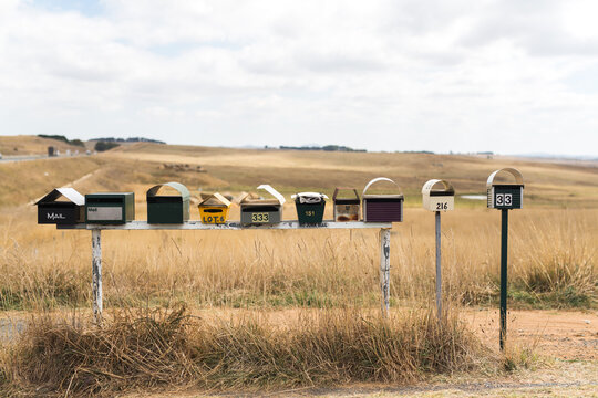 row of mailboxes on a rural road