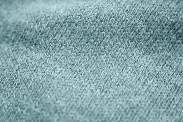 Obraz premium Close up of green knitted textured background.