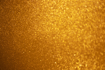 Amazing trendy gold colour blurred unfocused bokeh  background 