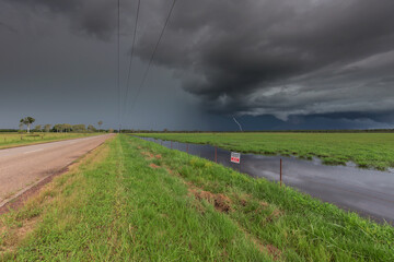 Storm with lightning over rural area