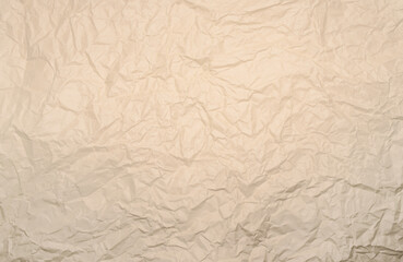 Crumpled, creased white or beige paper texture